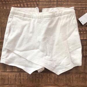 White envelope skort